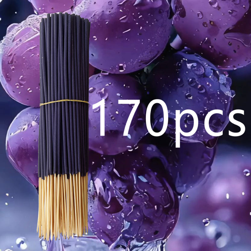 170pcs black and gold sticks with purple grapes in the background