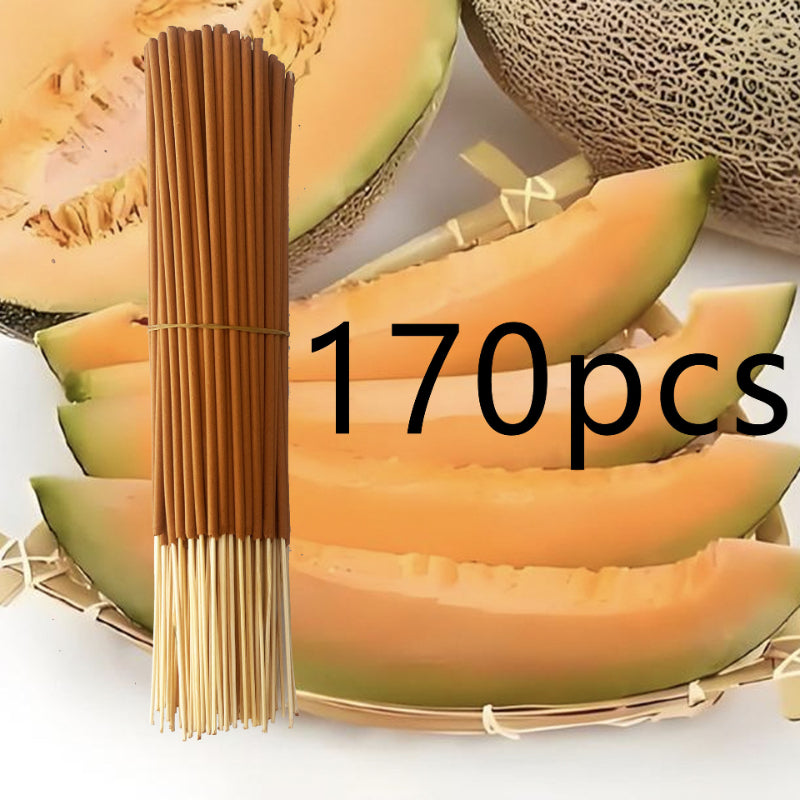 Bamboo skewers with a bundle of 170 pieces on a background of sliced melons.