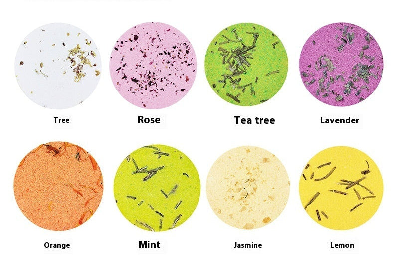 Bath salt tablets with various scents on a white background