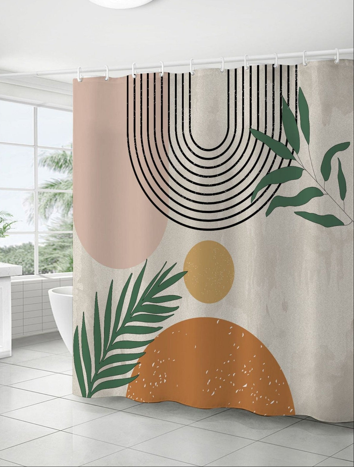 Bathroom with a shower curtain featuring abstract designs and leaves.
