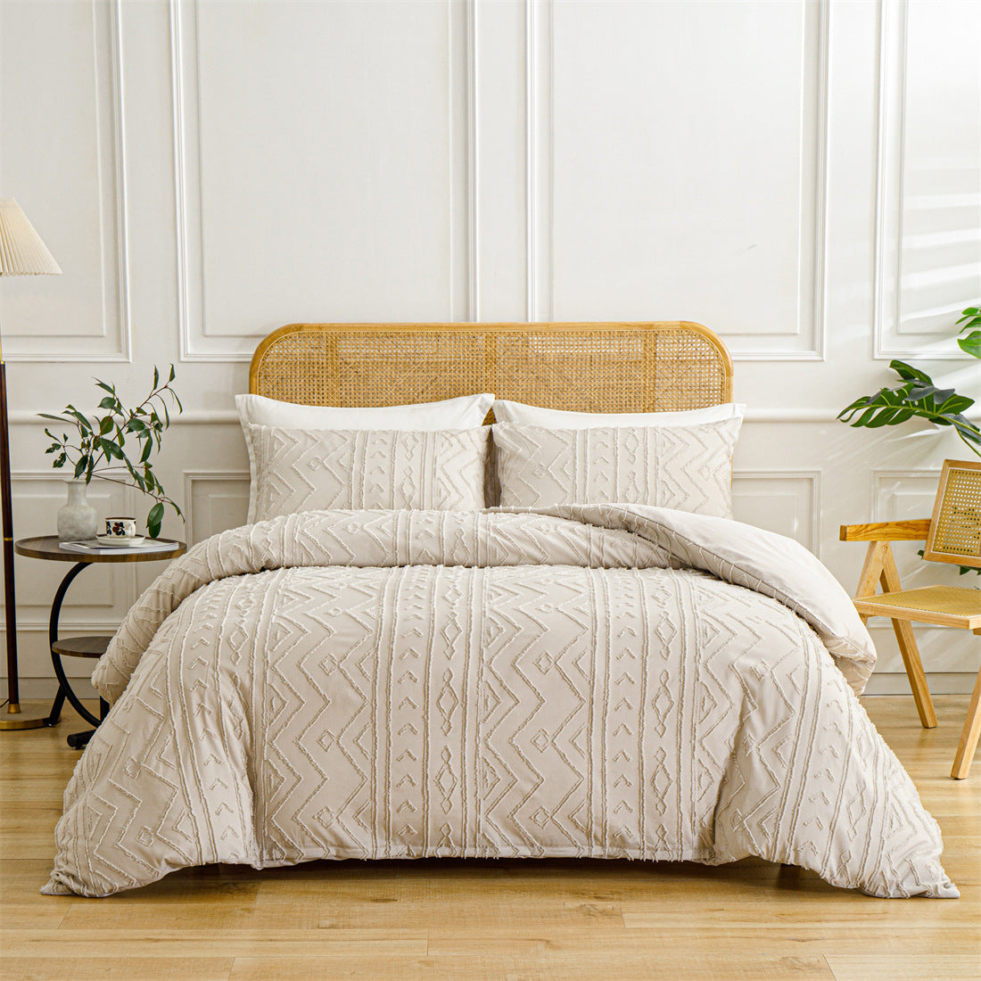 Beige quilted comforter set on a bed with a wooden headboard in a bedroom setting.