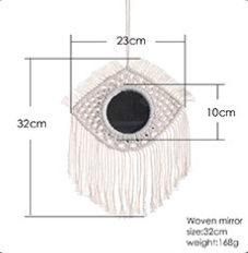 Woven mirror with tassels and measurements on a white background