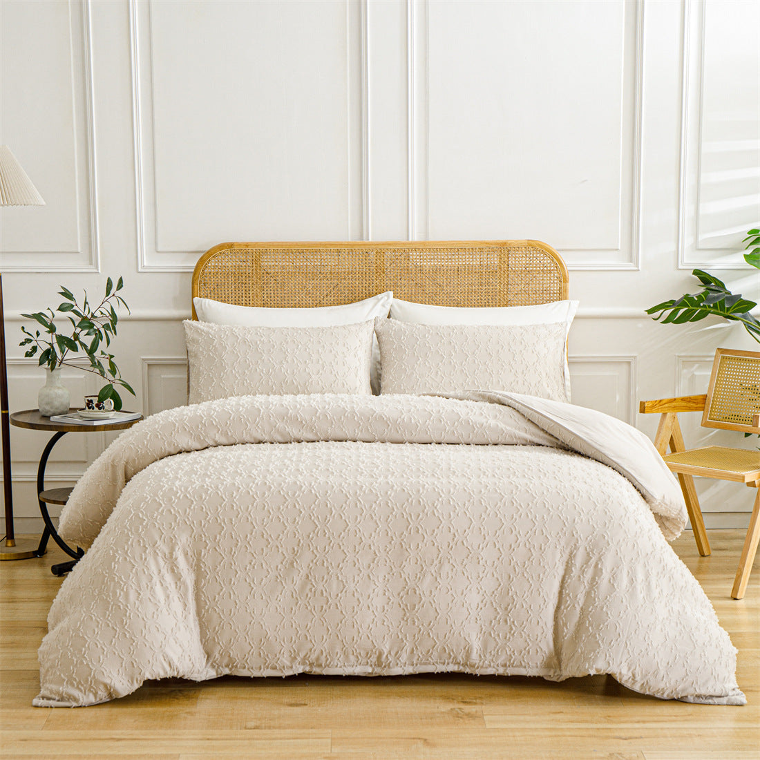 Beige textured comforter on a bed with a wooden headboard in a bright bedroom.