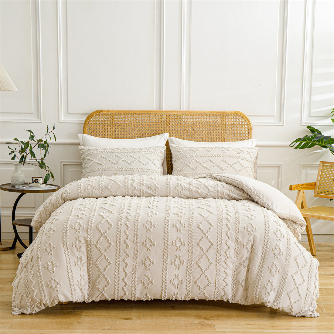 Beige quilted comforter set on a bed with a wooden headboard in a bedroom setting.