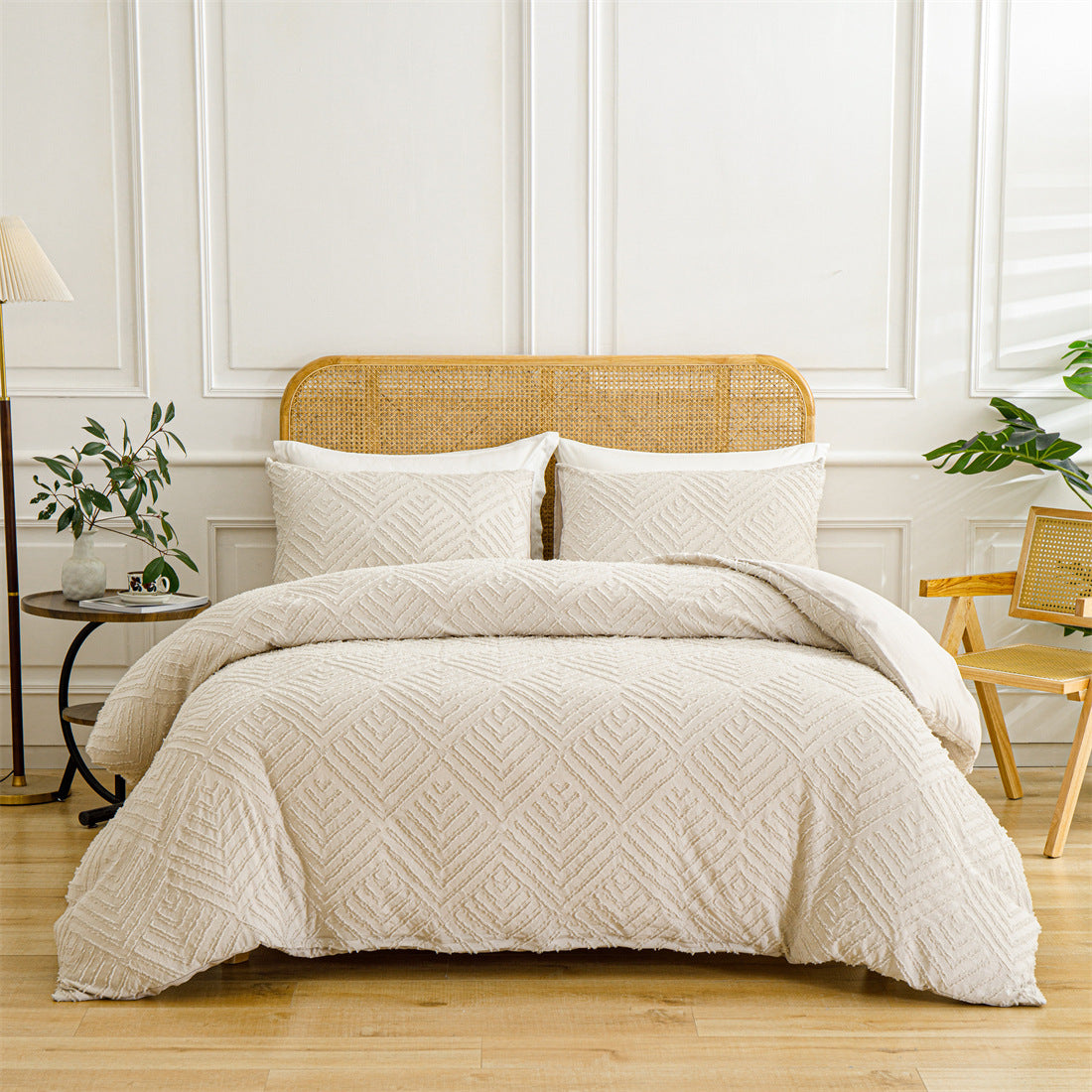 Beige quilted comforter set on a bed with a wooden headboard in a bedroom setting.
