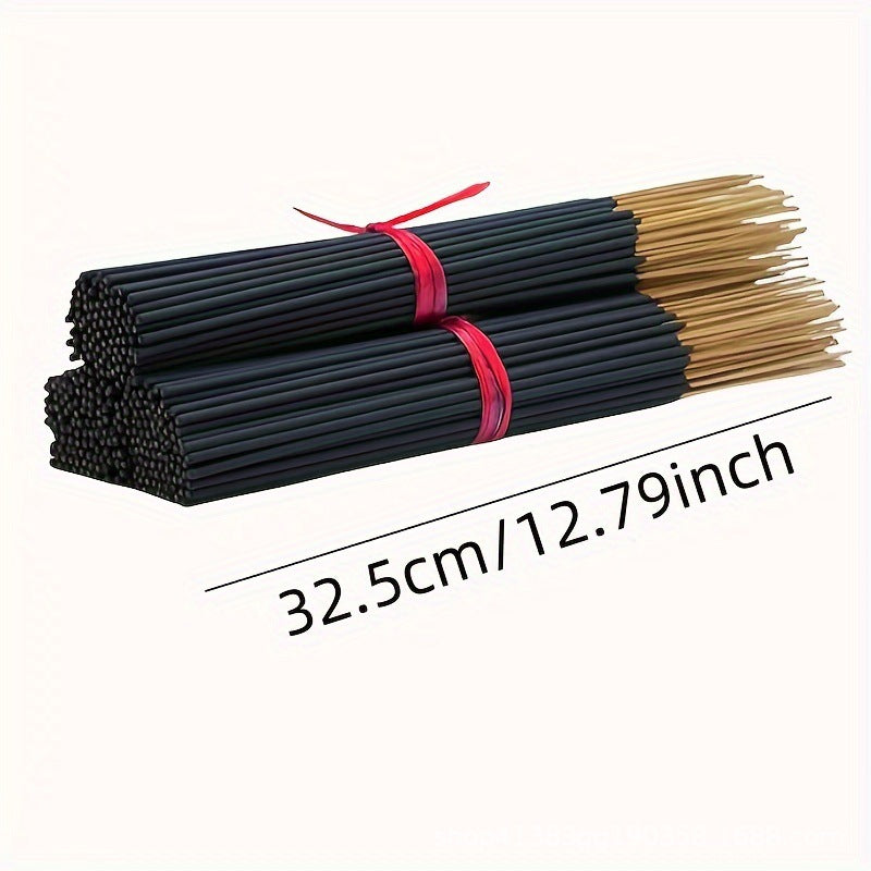 Two bundles of incense sticks with black and gold tips, tied with red ribbons, on a white background with measurement text.