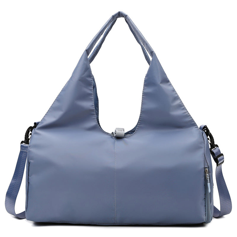 Blue shoulder bag on a white background