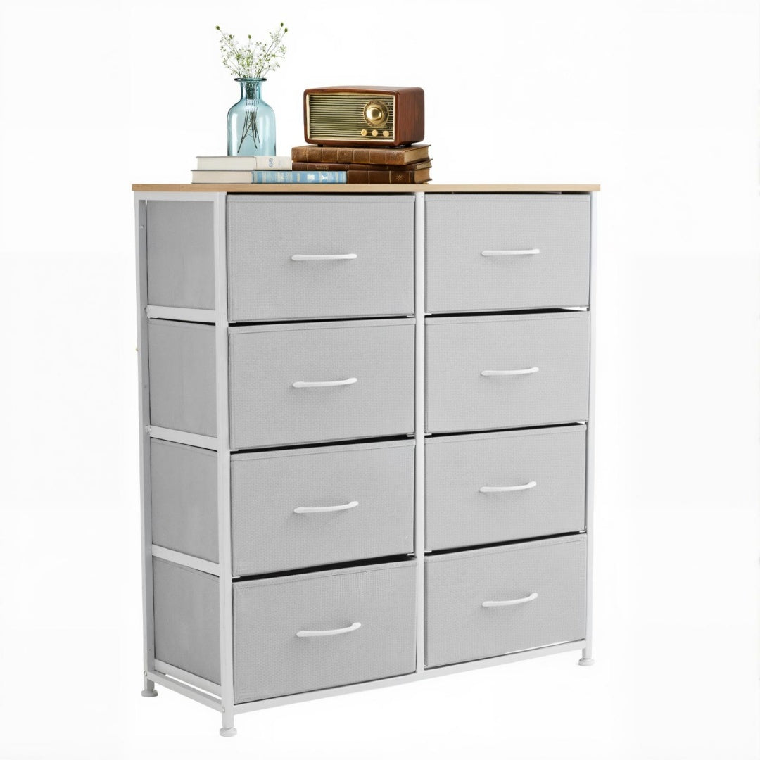 Gray dresser with multiple drawers on a white background
