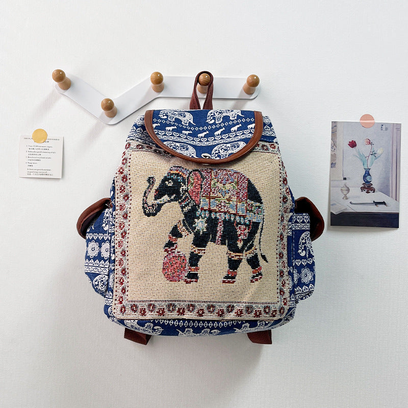 Backpack with elephant design on a white background