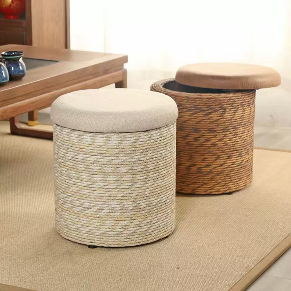 Two round storage ottomans, one woven and one with a cushion, in a living room setting.