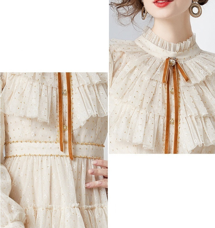 Close-up of a white dress with a brown ribbon detail, focusing on the neckline and waist design.