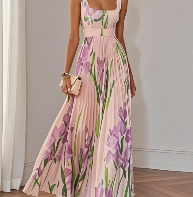 Woman wearing a floral dress with a plain background