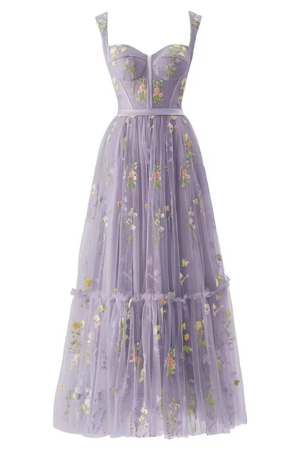 Lavender dress with floral embroidery on a white background