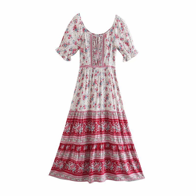 Floral dress with red and white pattern on a white background