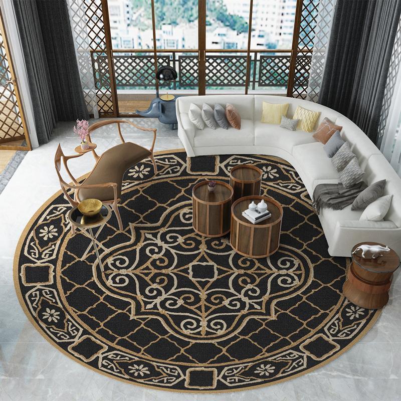 Decorative black and gold round rug in a living room setting with furniture.