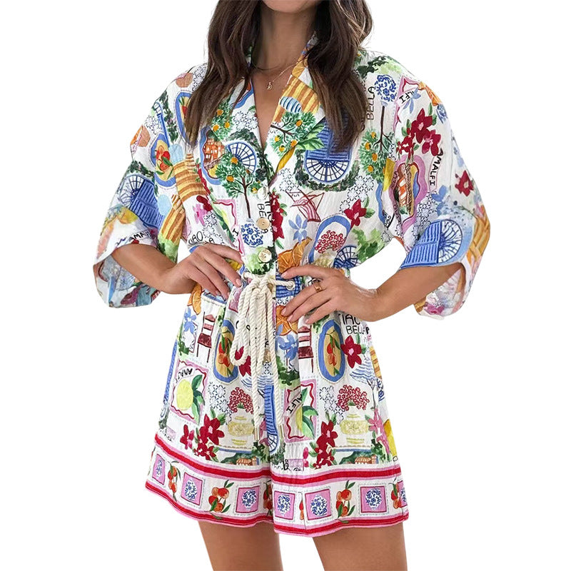 Woman wearing a colorful patterned robe on a white background