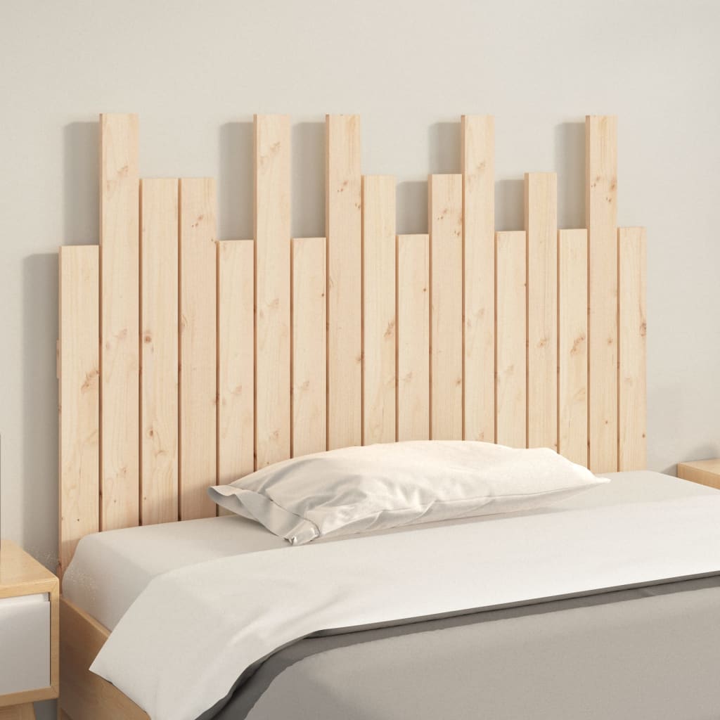 Wooden headboard with a bed in a minimalistic room