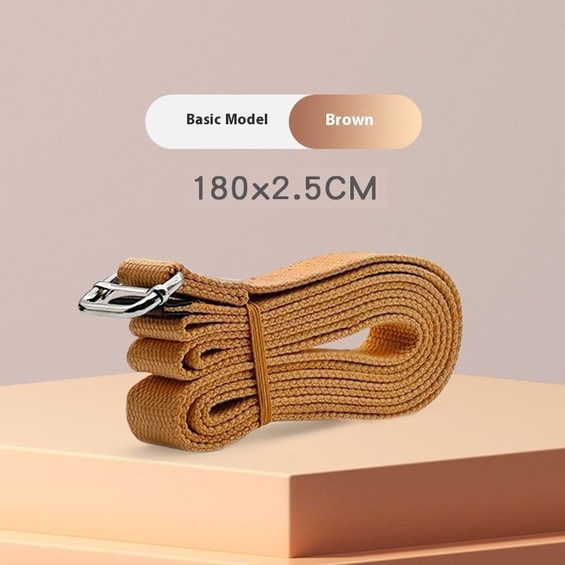 Brown belt with silver buckle on a beige platform and background