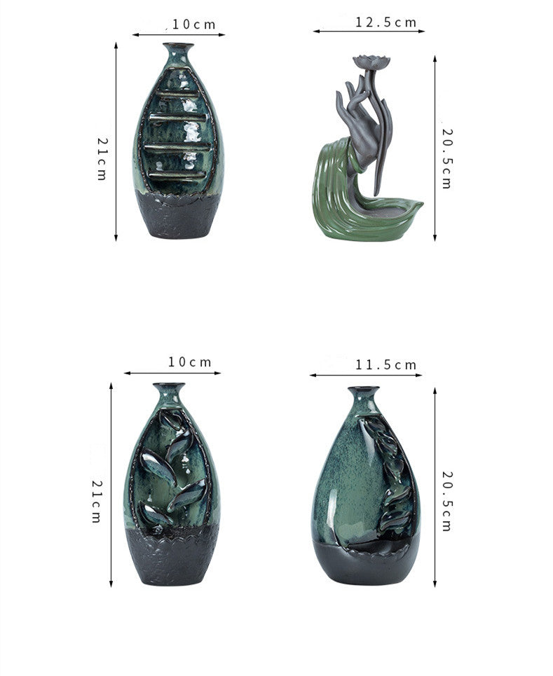 Ceramic incense burner with decorative design on a wooden surface