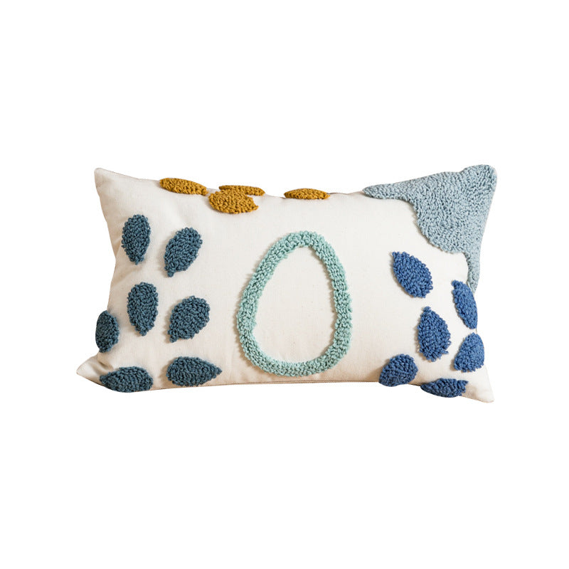 Decorative pillow with a floral pattern on a white background