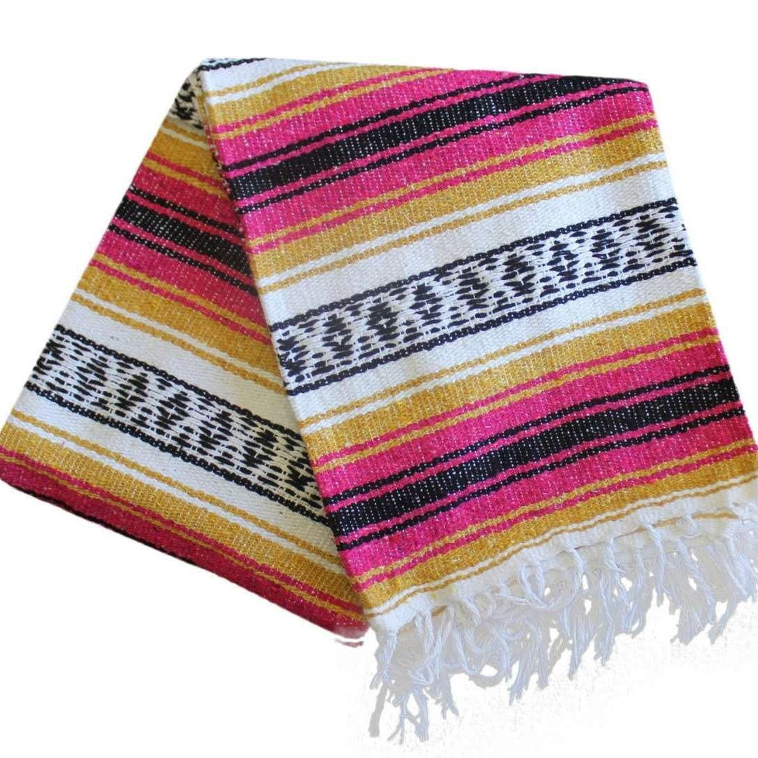 Colorful striped blanket with fringes on a white background