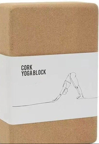 Cork yoga block with packaging on a white background
