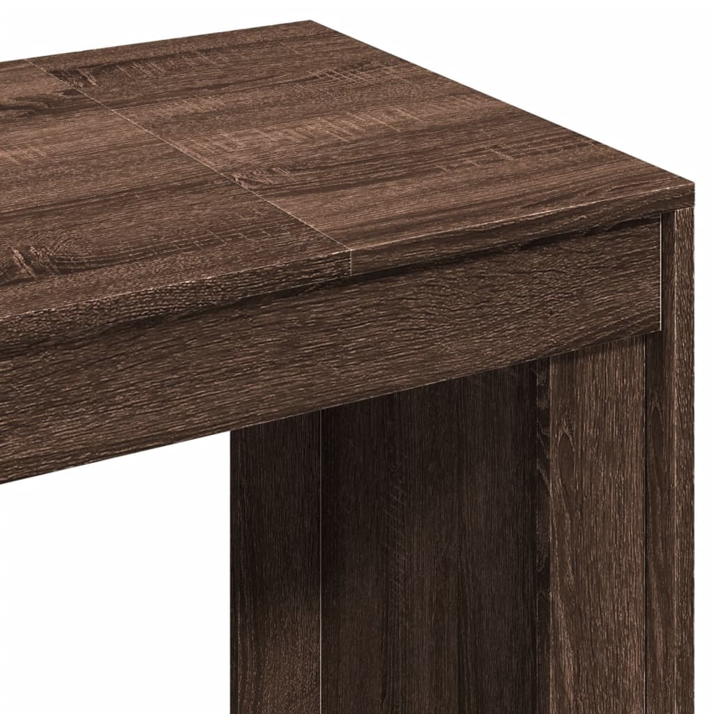 Close-up of a wooden table with a brown finish on a white background