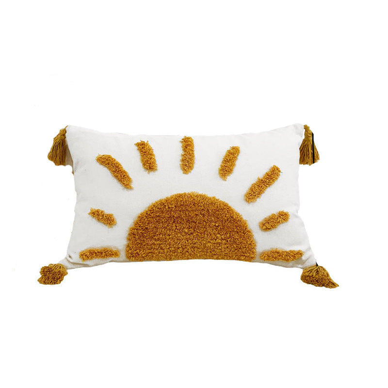 Decorative pillow with sun design and tassels, shown with measurements on a white background.