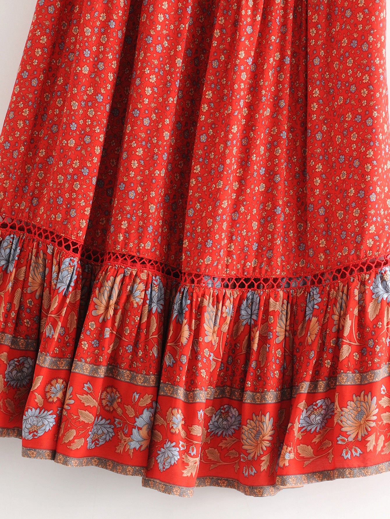 Red floral patterned skirt on a white background