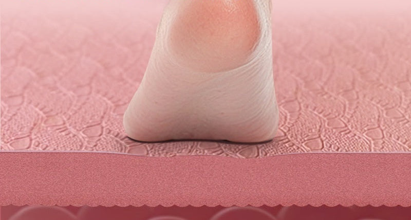 Foot on a pink textured surface with text about natural rebound and long-lasting performance.