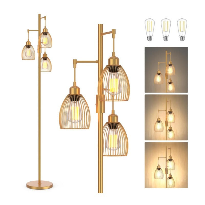 Gold floor lamp with glass shades and inset images showing light effects.