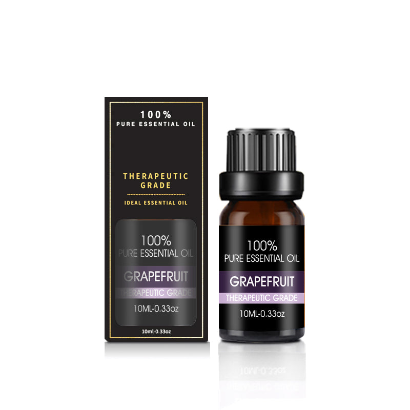 Grapefruit essential oil bottle and packaging on a white background