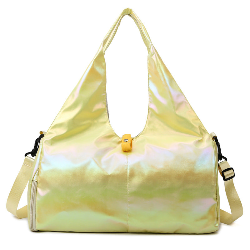 Holographic yellow handbag with a strap on a white background