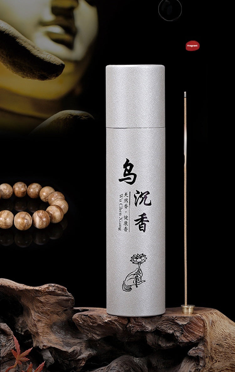 Incense stick holder with incense on a dark background