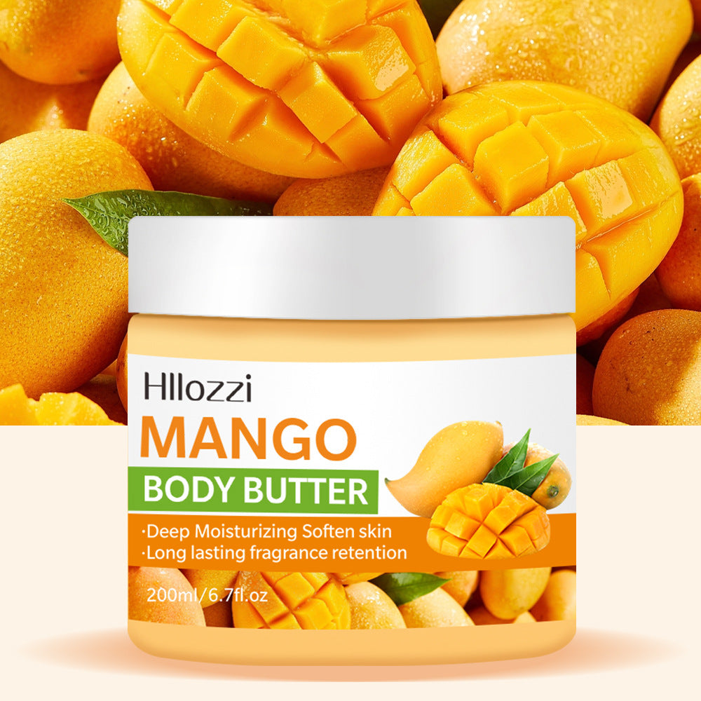 Jar of Hillozzi Mango Body Butter with mangoes in the background