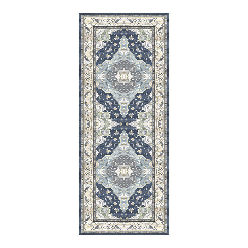 Decorative rug with a geometric pattern on a white background