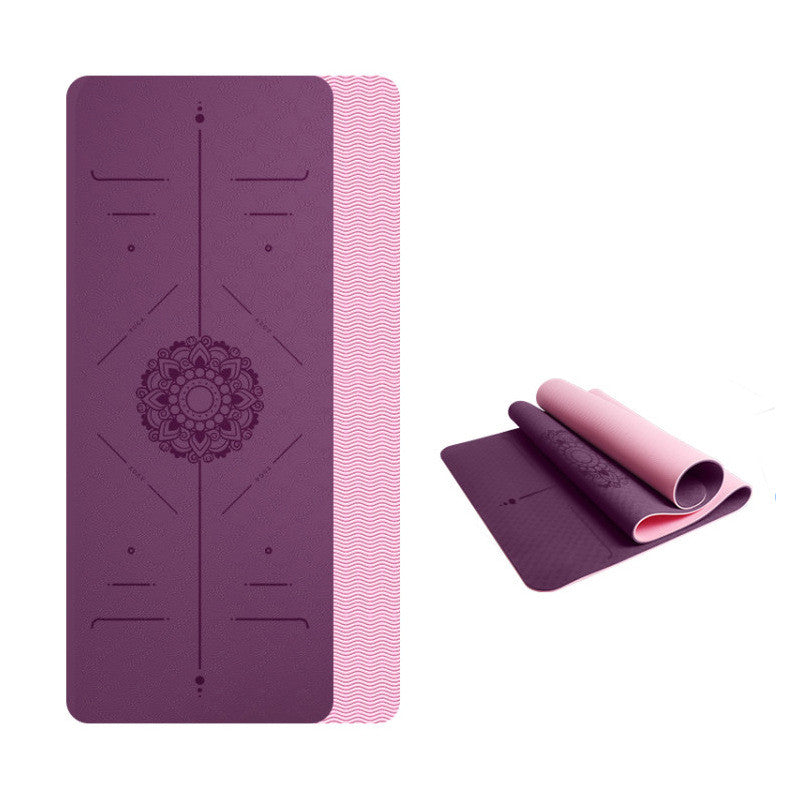 Purple and pink yoga mat with mandala design on a white background
