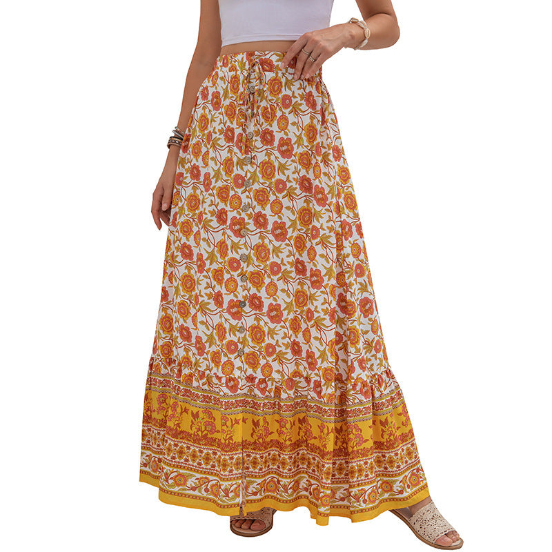 Woman wearing a floral long skirt with a white background