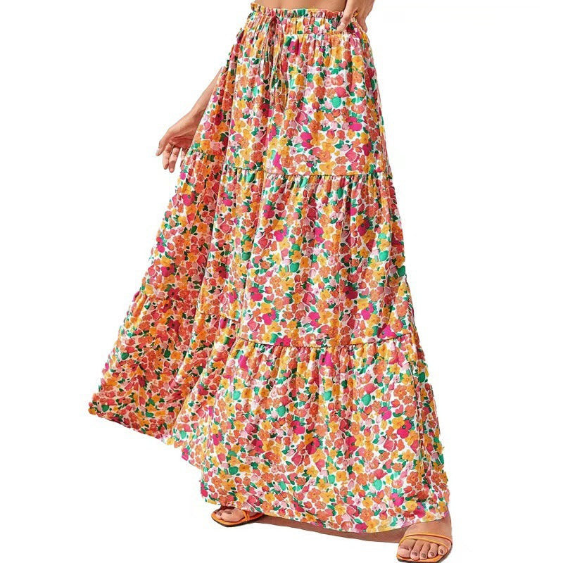 Colorful floral tiered skirt on a white background