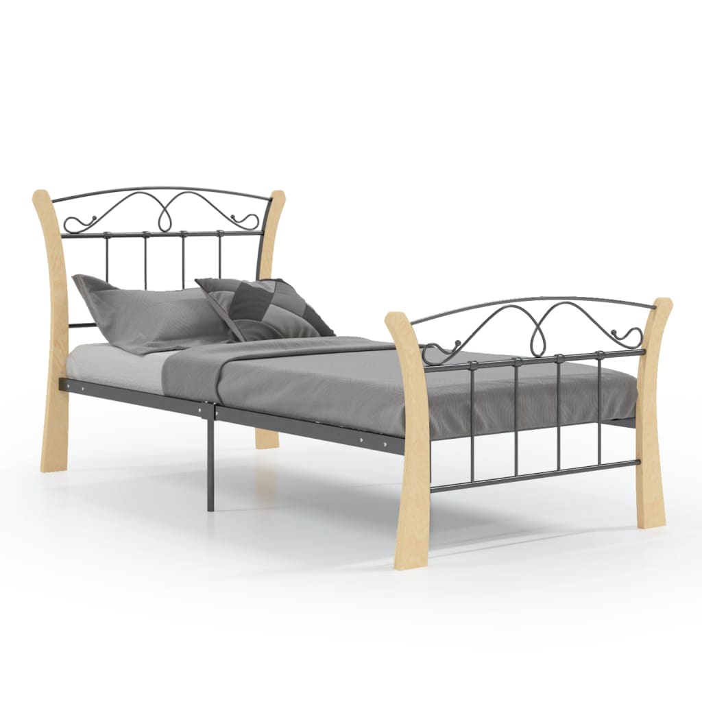 Bed with metal frame and wooden legs on a white background