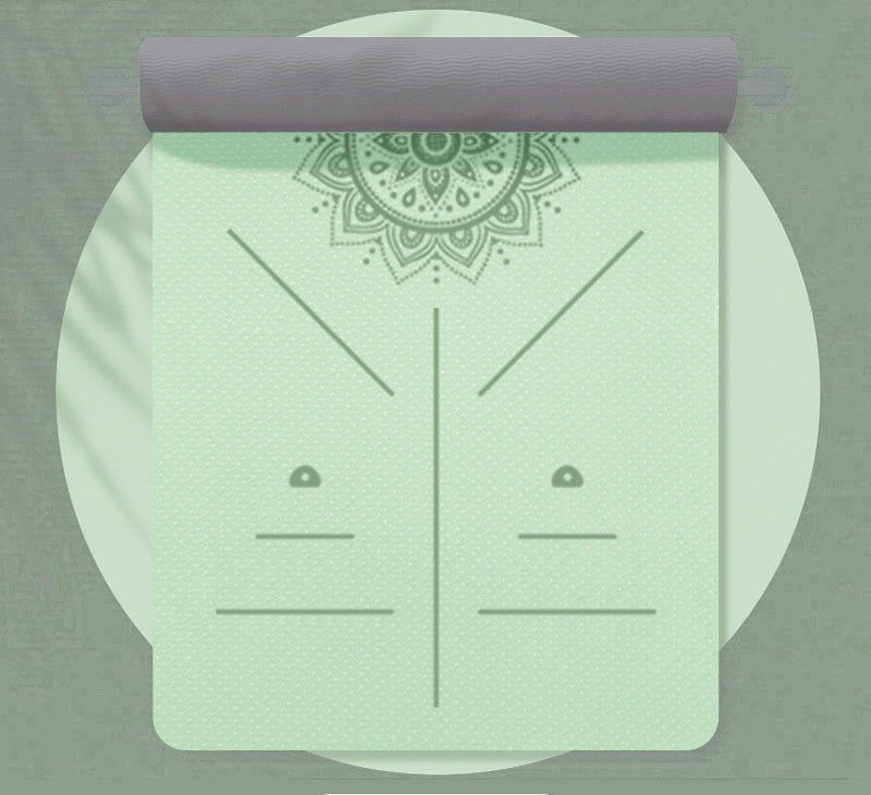 Mint green yoga mat with gray border on a matching background