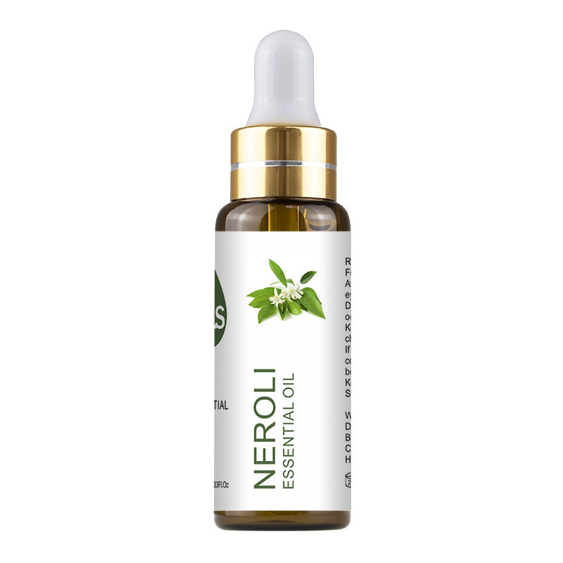 Neroli essential oil bottle with dropper on a white background