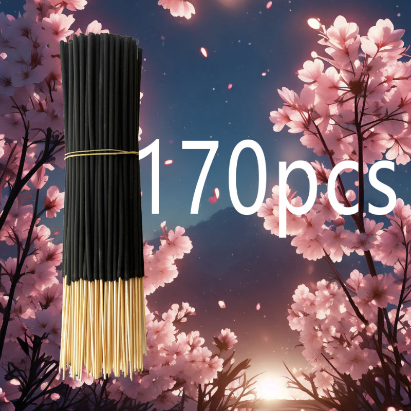 Pack of black and gold sticks with cherry blossom background