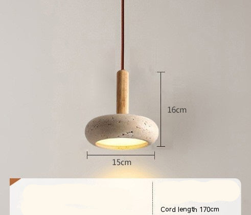 Pendant light with dimensions and material details on a gray background