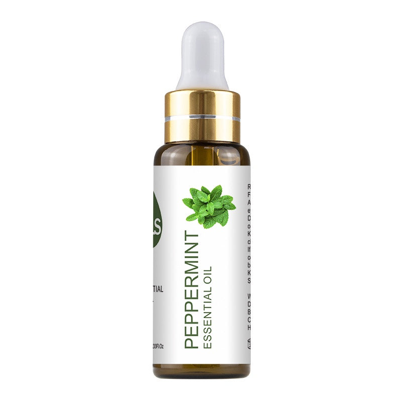 Peppermint essential oil bottle with dropper on a white background