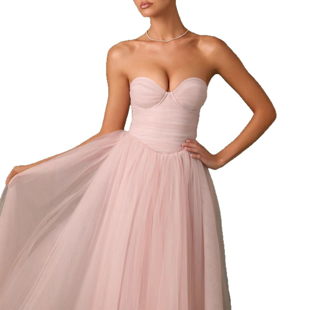 Pink strapless gown on a white background