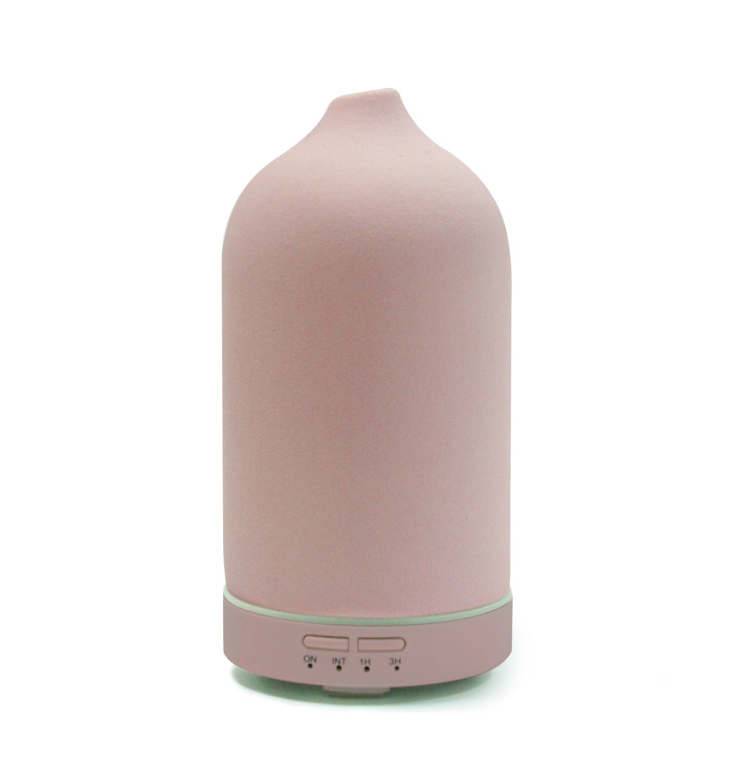 Pink essential oil diffuser on a white background