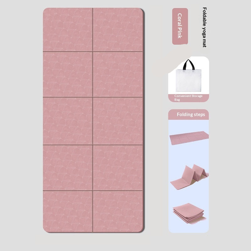 Pink foldable yoga mat with packaging and storage bag on a light gray background