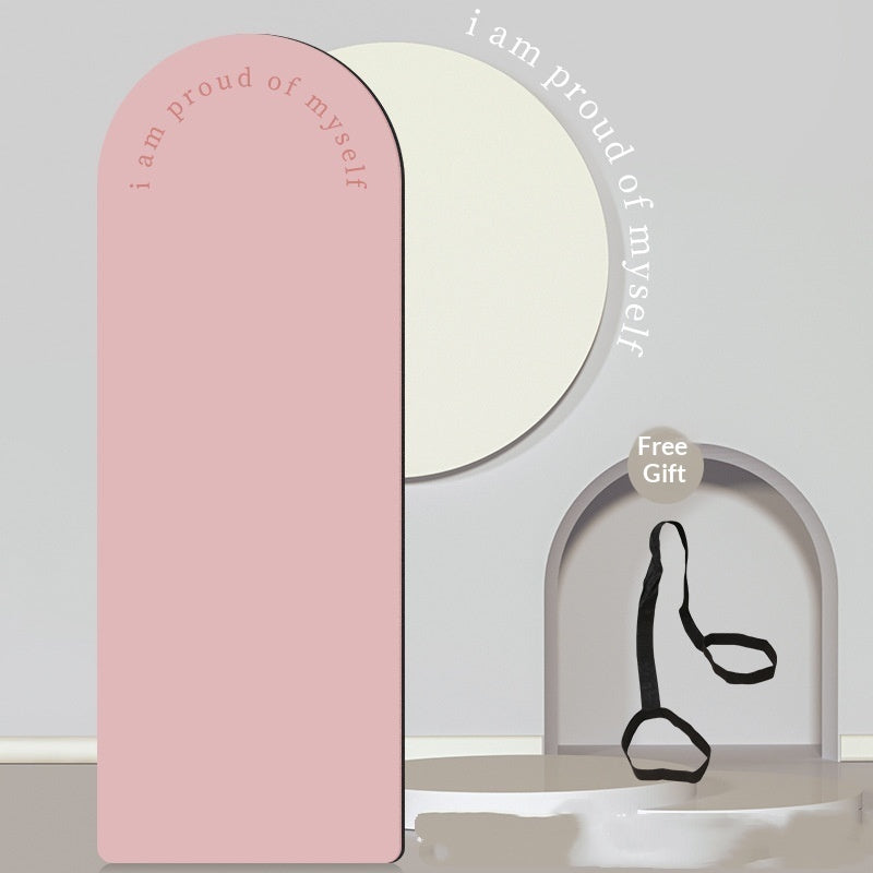 Pink mirror with 'I am proud of myself' text and a free gift label on a light gray background.