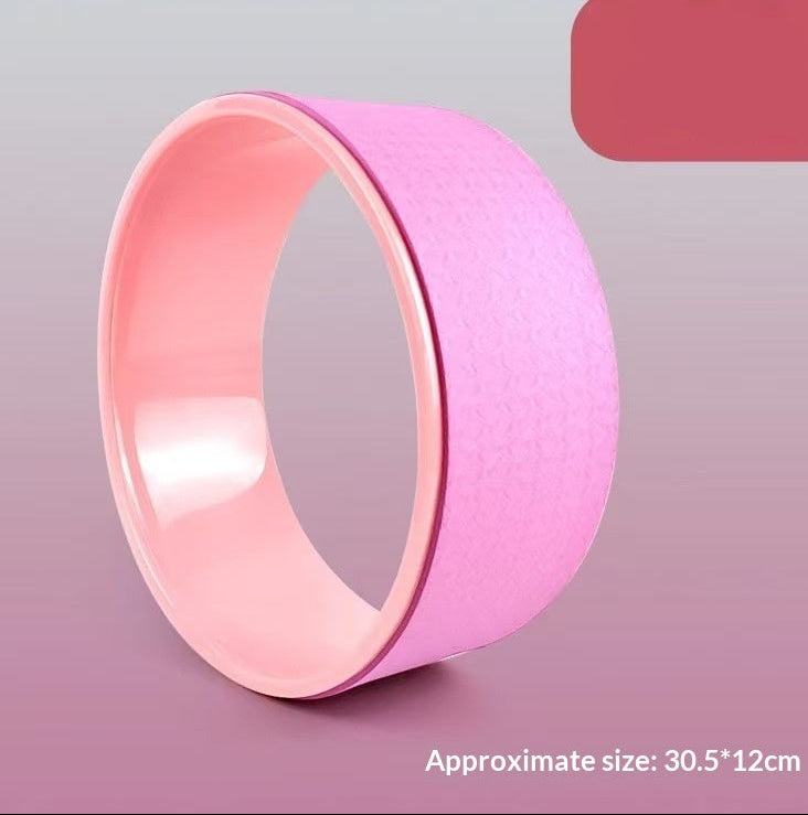 Pink yoga wheel with 'Beginner' and 'Advanced' labels on a gradient background